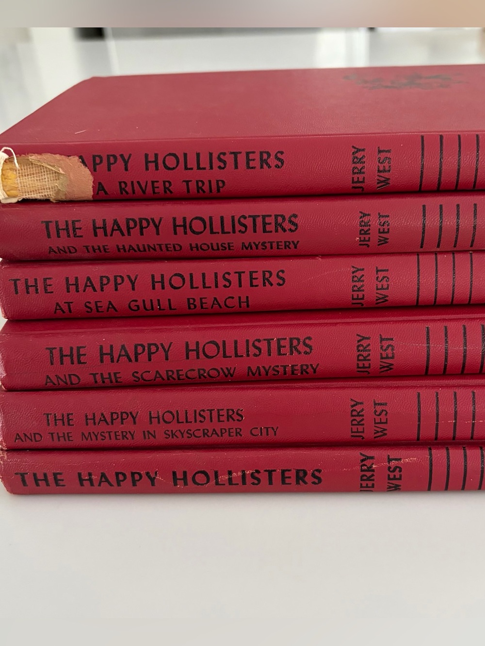 vintage "The Happy Hollisters" red hardcover books by Jerry West,
Set of 6.